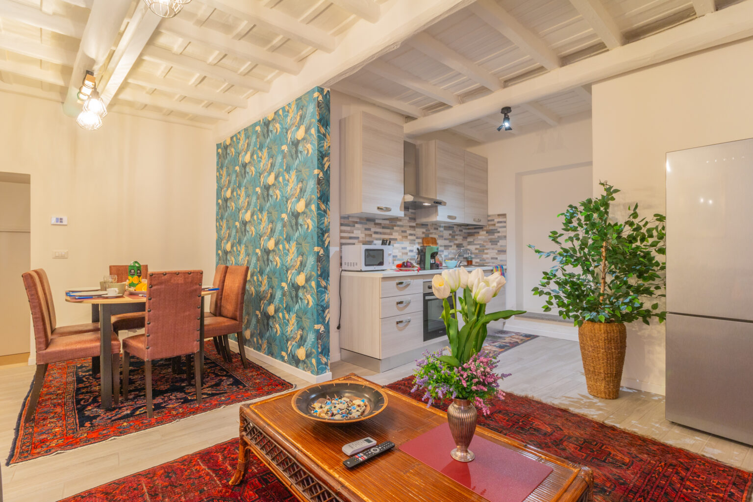 Soggiorno con cucina dell'appartamento Deluxe Bella Galiana